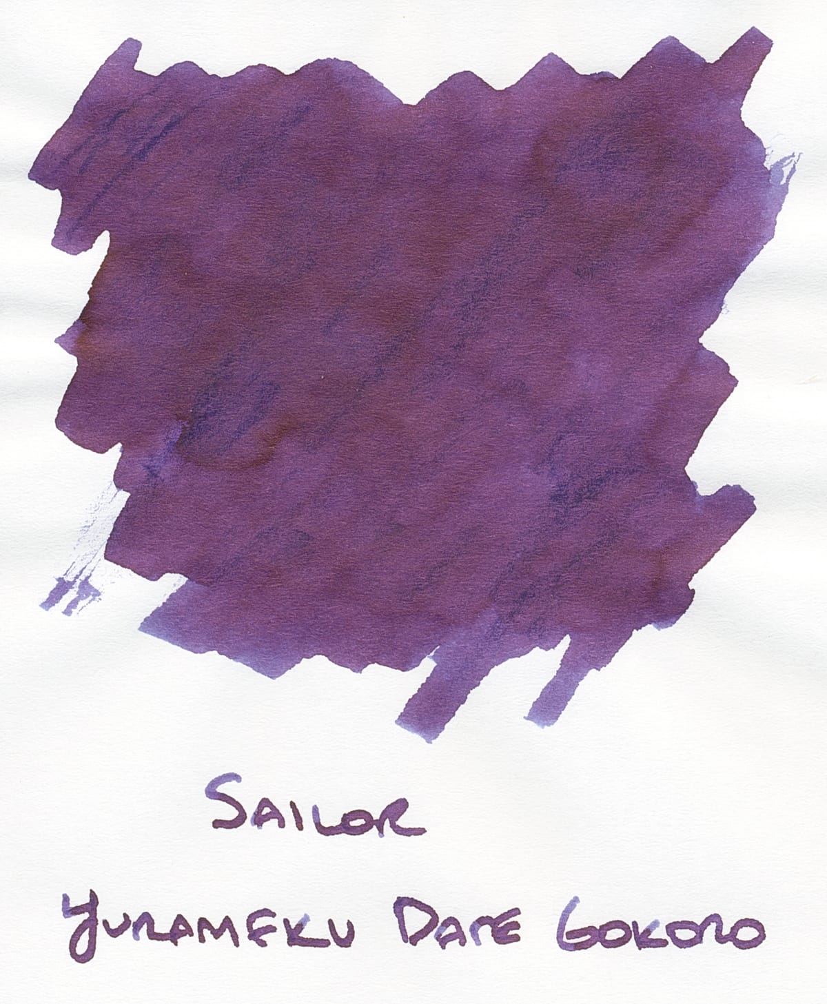 Scan of an ink swatch of a bluish purple fountain pen ink with reddish chromoshading labeled Sailor Yurameku Date Gokoro