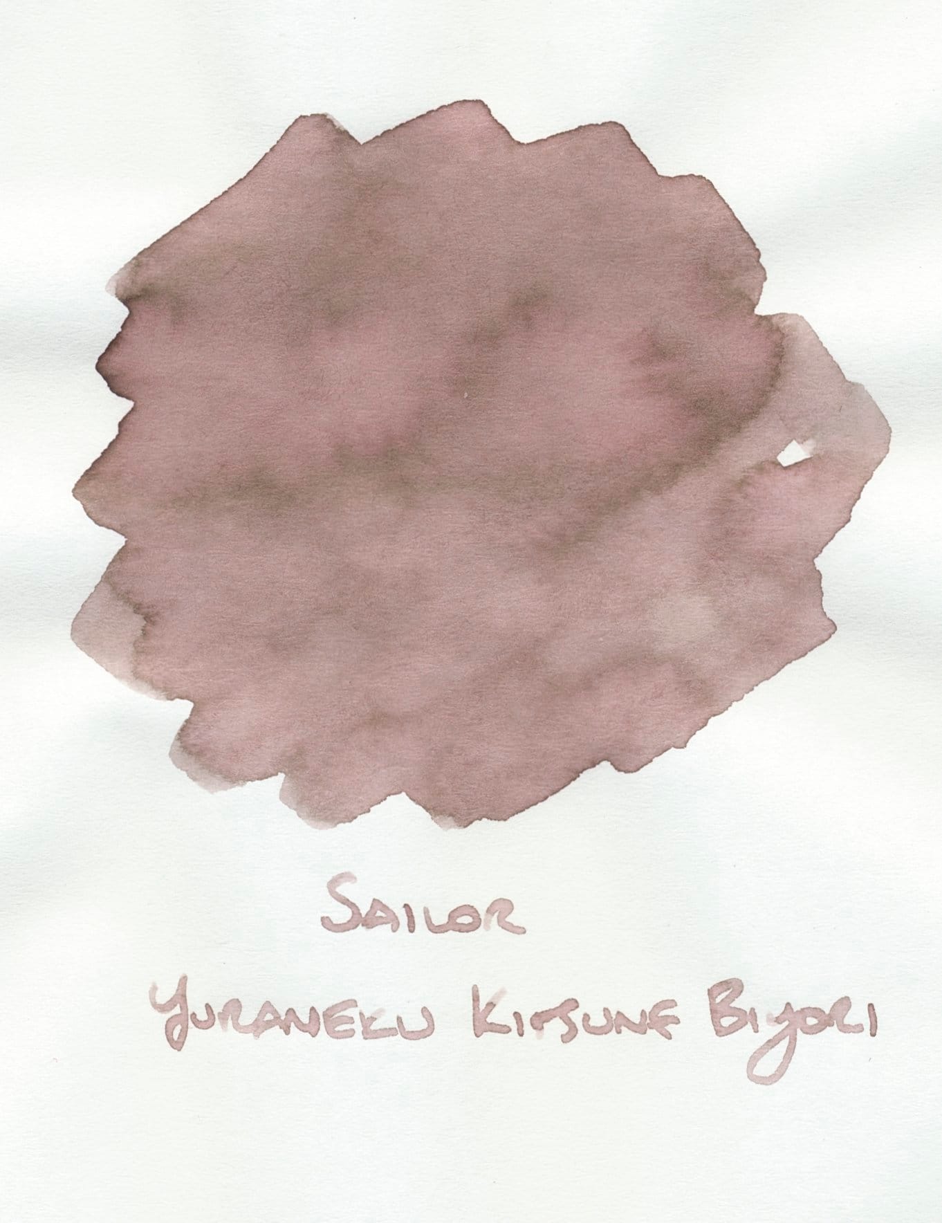 Close up of ink swatch for Sailor Yurameku Kitsune Biyori fountain pen ink, a medium beige color with pink undertones