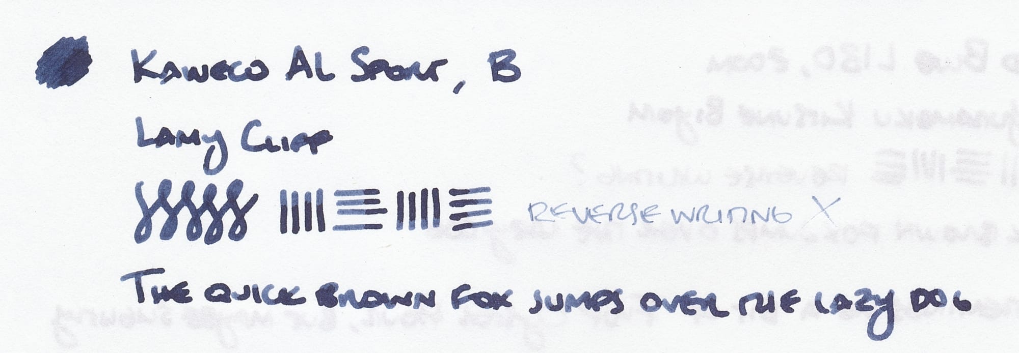 Writing sample using a Kaweco AL Sport fountain pen with a B nib, listing the pen name, ink name, some figure-8s, horizontal and vertical lines, demonstration of reverse writing, and "The quick brown fox jumps over the lazy dog"