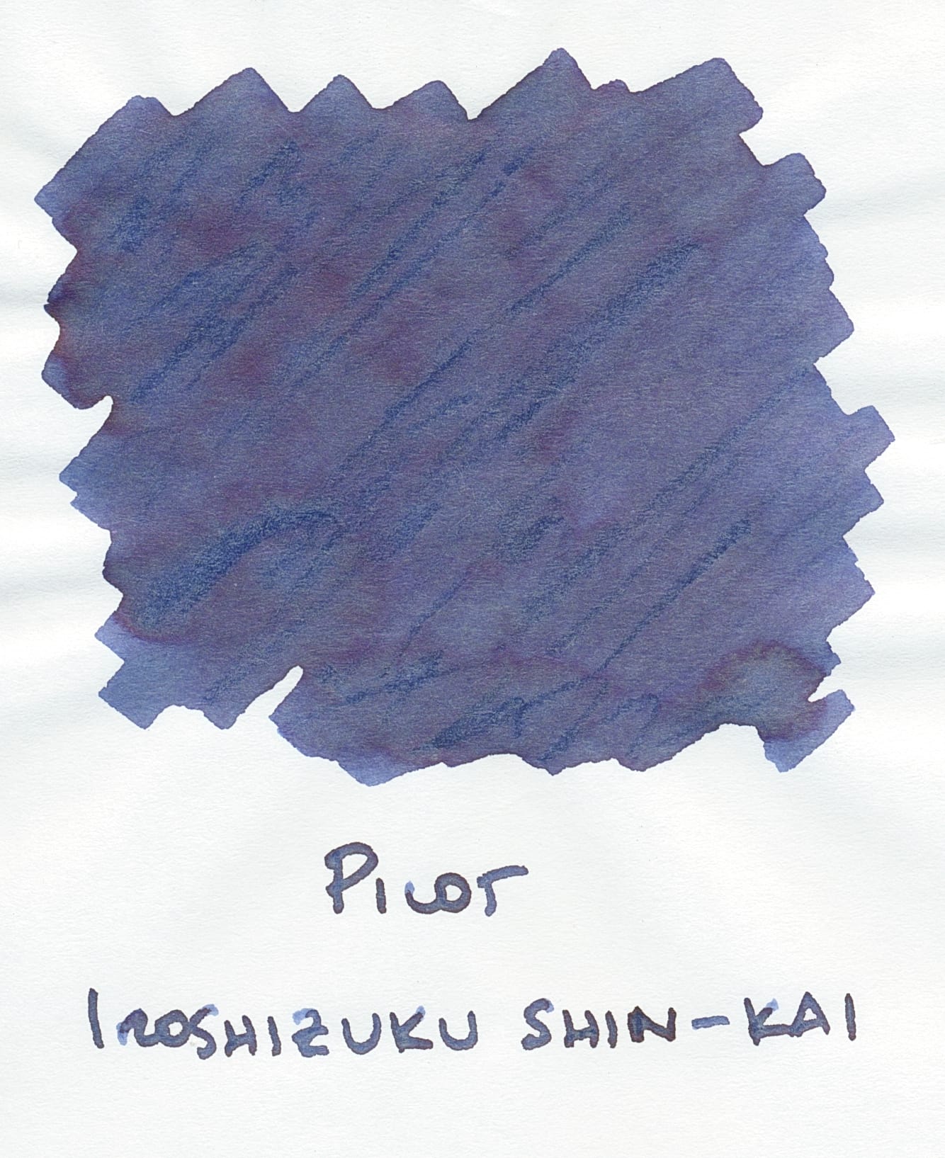 Scan of an ink swatch on paper for a blue-black ink that shows a little bit of red sheen where the ink pooled heavily, Pilot Iroshizuku Shin-Kai