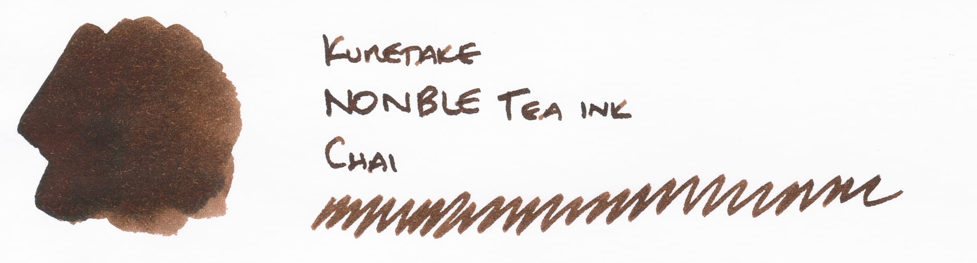 A simple ink swatch painted into a circular blob on Rhodia paper with the name written out, and a long squiggle underneath; Kuretake NONBLE Tea Ink, Chai