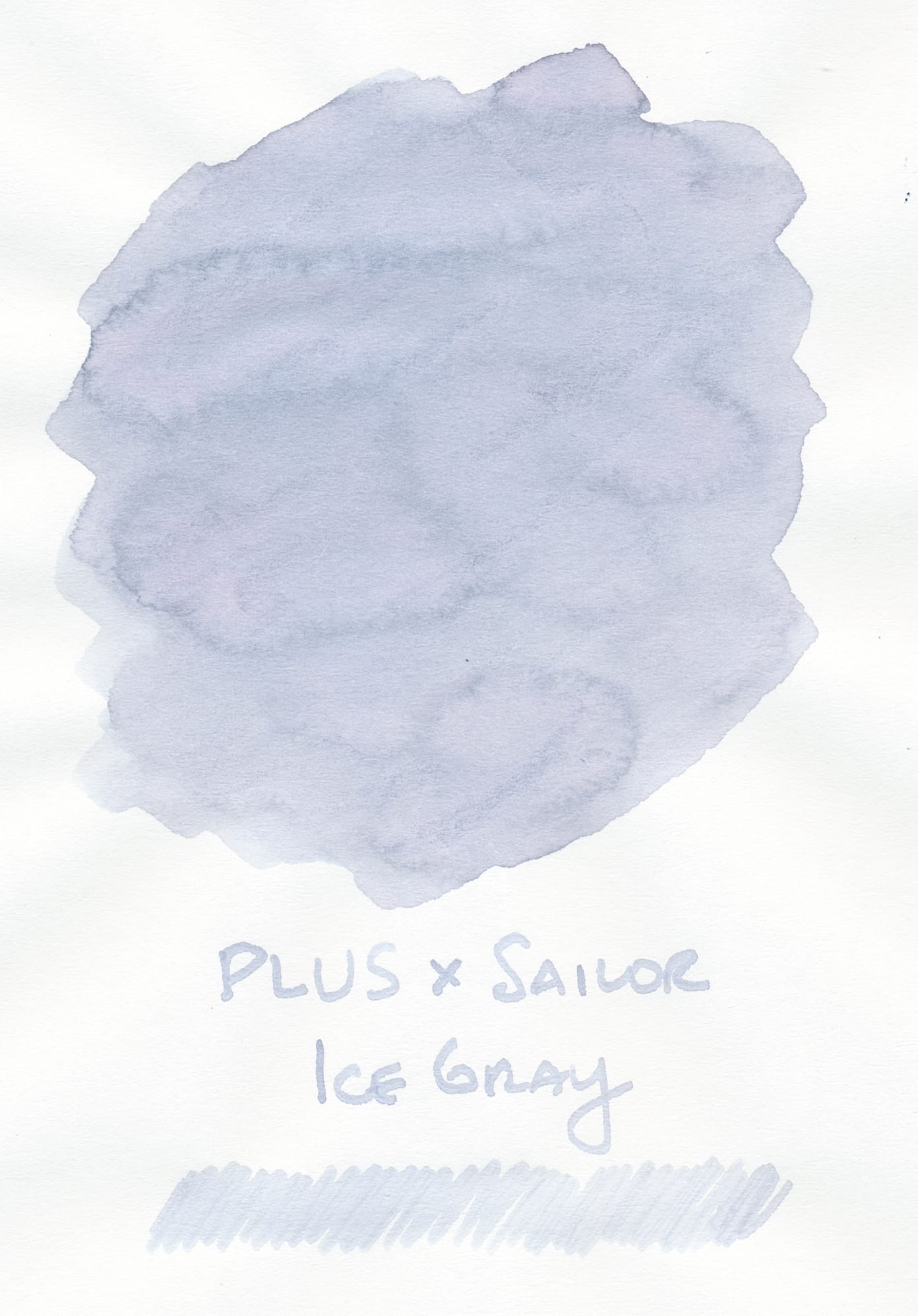 Fountain pen ink swatch on white Tomoe River paper: a cloudy, cool gray color