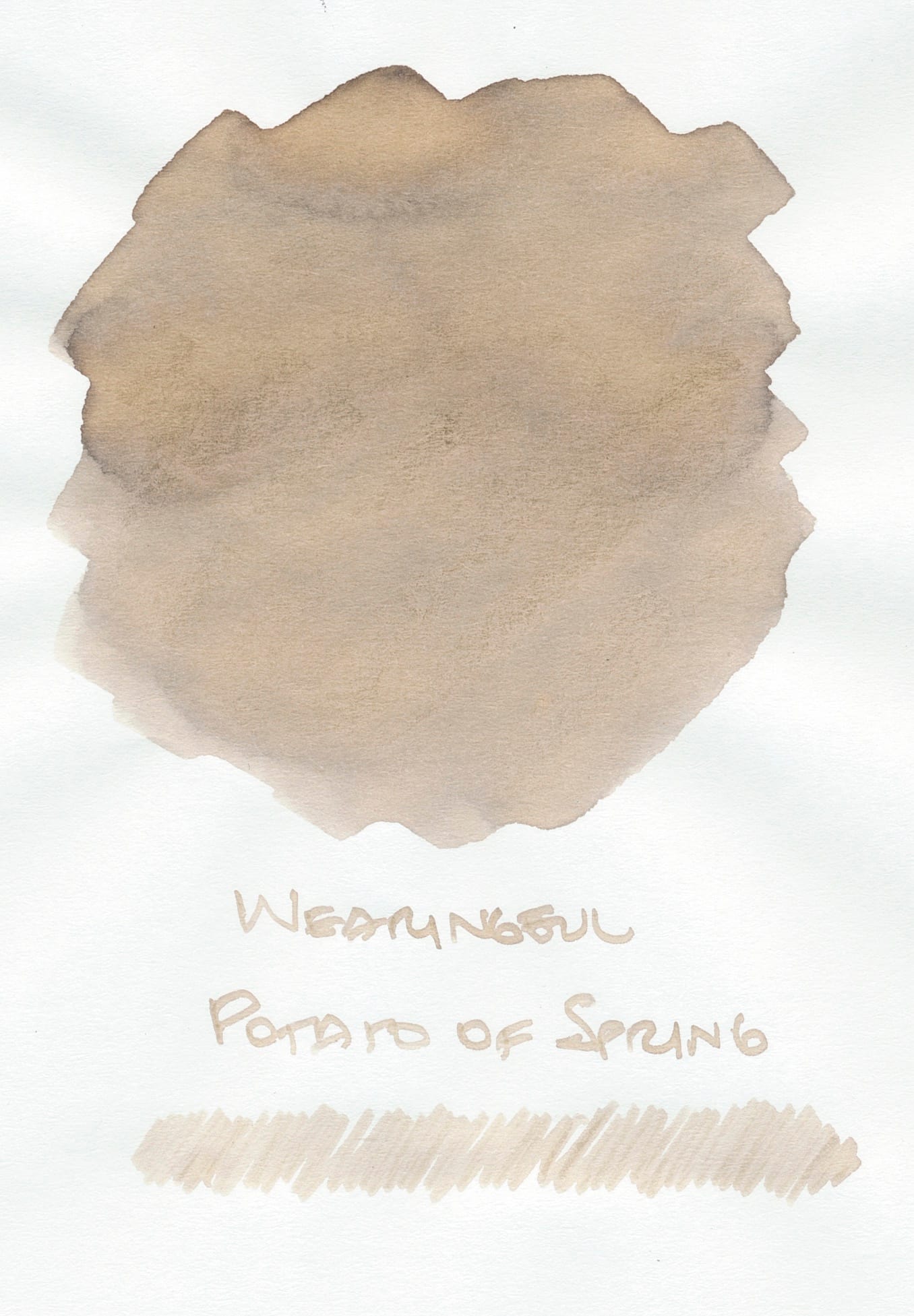 Pale tan/beige ink swatch on white paper with the name of the ink written underneath (in the same ink), Wearingeul Potato of Spring, and a scribble underneath the writing using the ink