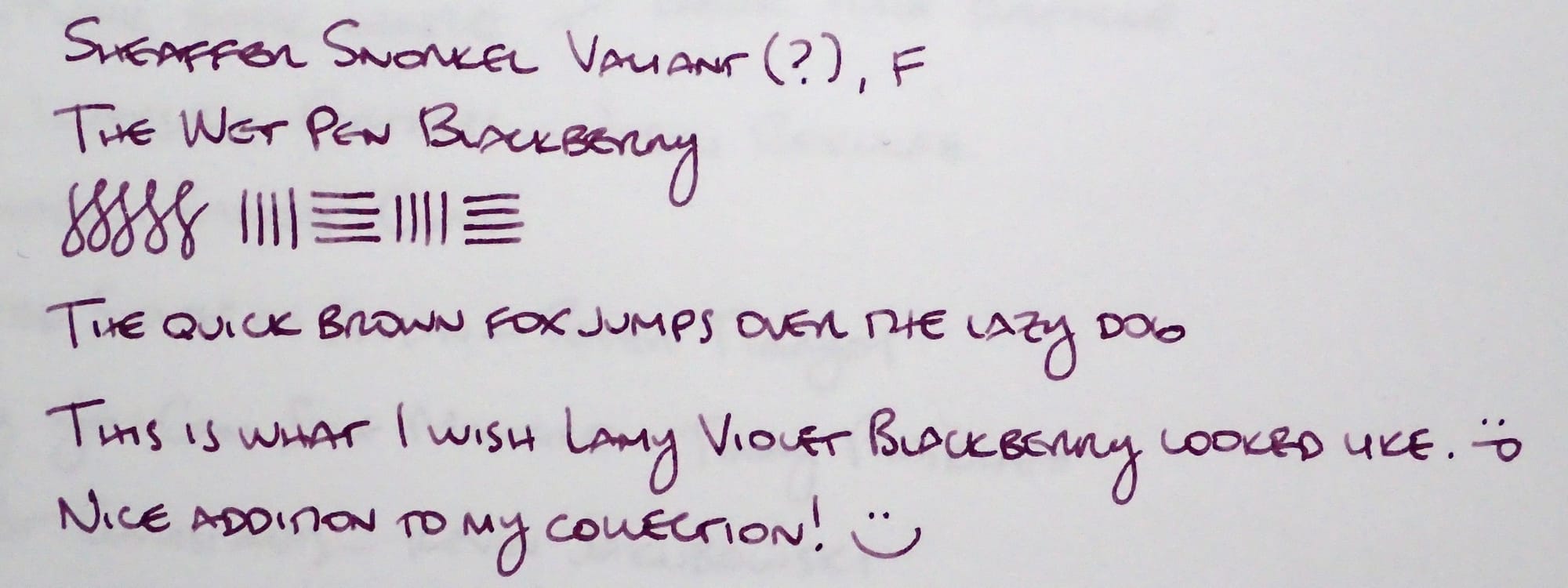 Writing sample in a berry-colored ink on white paper: "Sheaffer Snorkel Valiant (?), F; The Wet Pen Blackberry; figure-8s and horizontal and vertical lines; The quick brown fox jumps over the lazy dog; This is what I wish Lamy Violet Blackberry looked like. :p; Nice addition to my collection! :)"