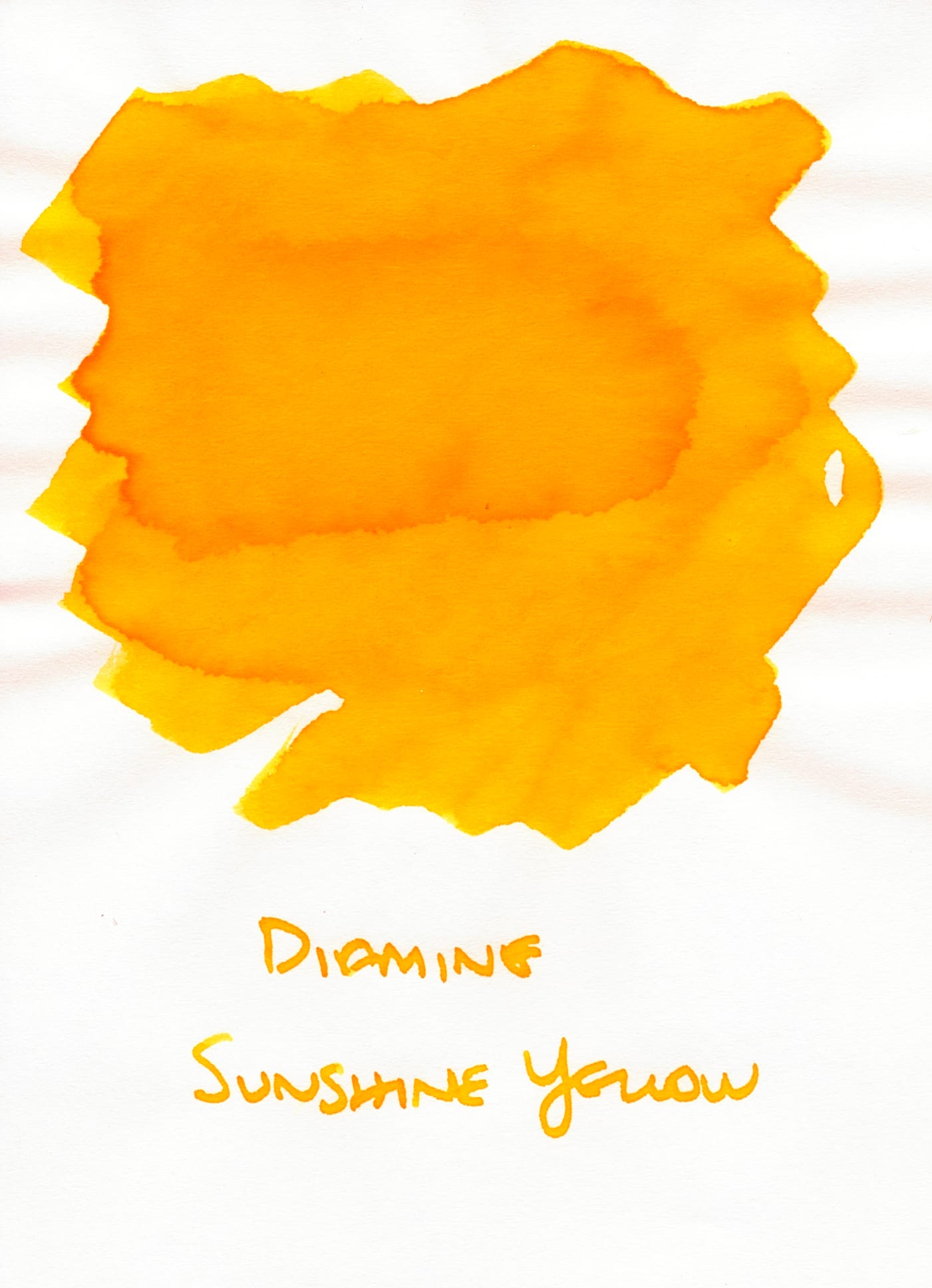 Sunny orange ink swatch that is more orange-yellow than the previous inks, labeled Diamine Sunshine Yellow