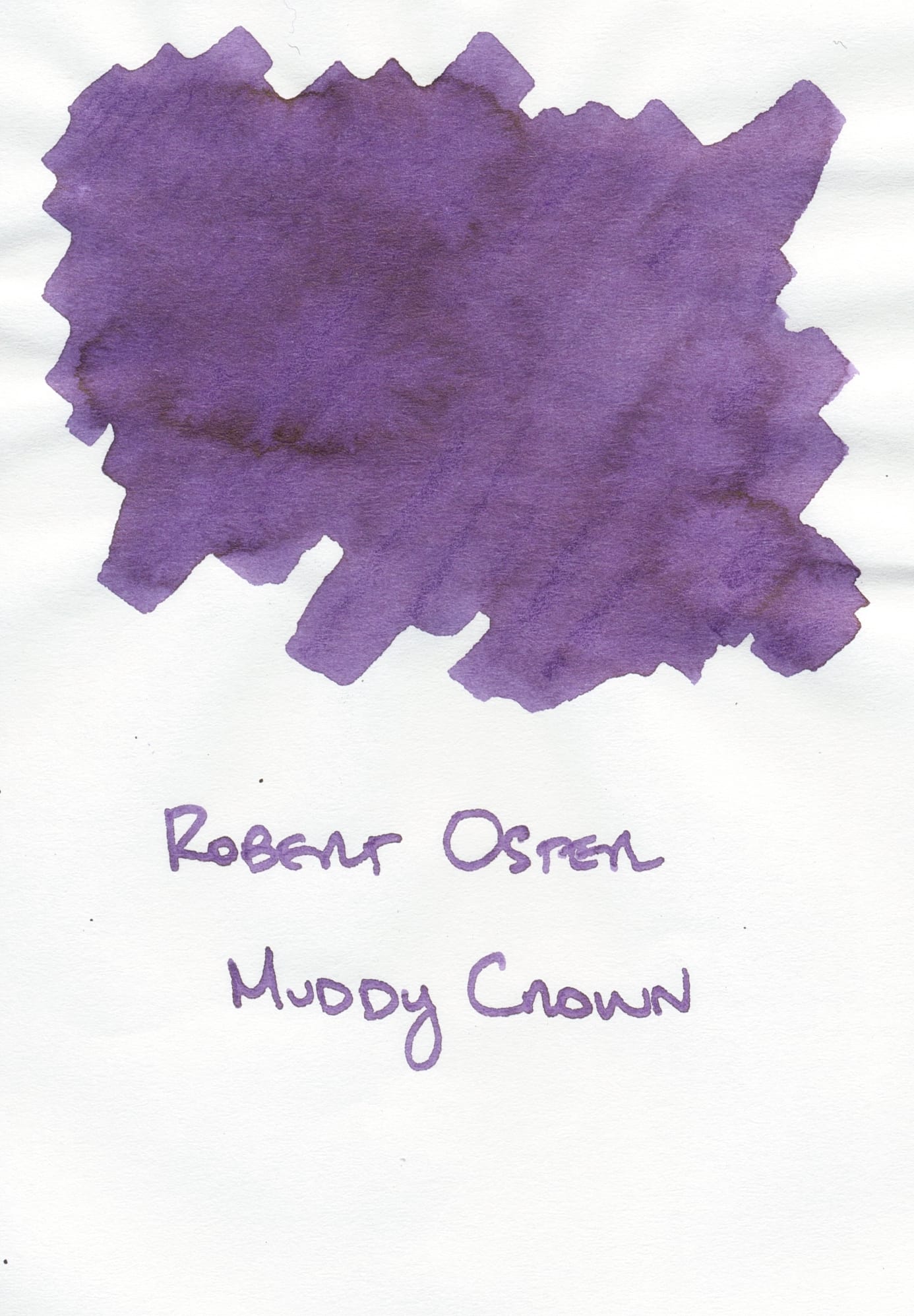 Swatch of a cooler, slightly dull purple fountain pen ink labeled "Robert Oster Muddy Crown" underneath
