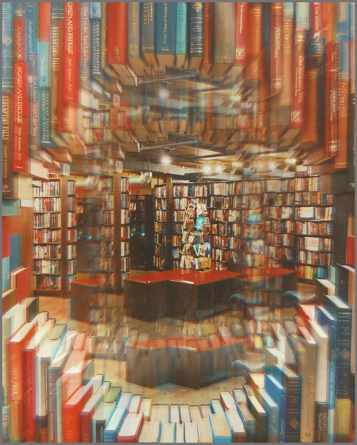 Looking through a circular frame made of books at the seating area in a downtown LA bookstore